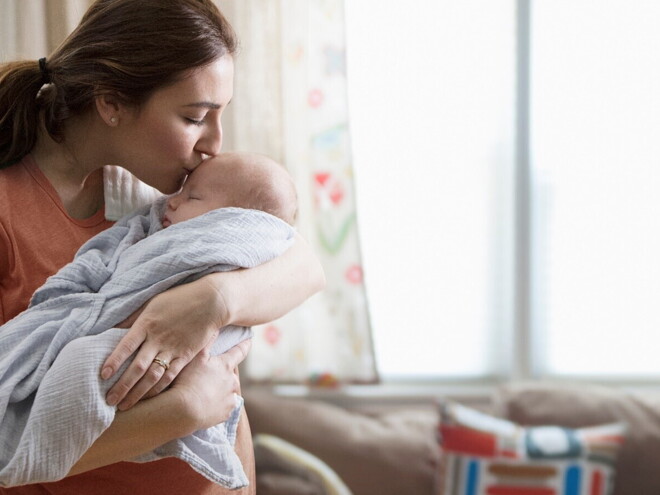 A mother showing what youe need to do when bringing baby home.