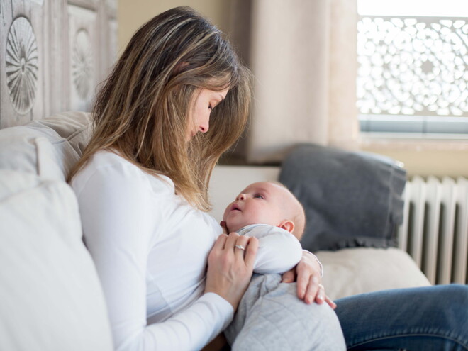 A mother taking care of his baby during maternity leave.