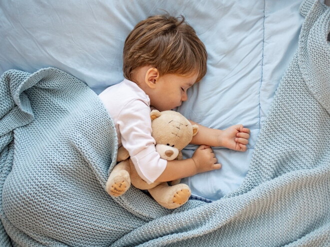 A child sleeping without any toddler sleep problems.