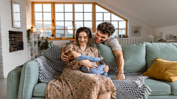 A couple enjoying their baby after a good nutrition for fertility.